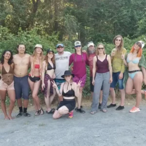 Retreat group posing together after a river trip