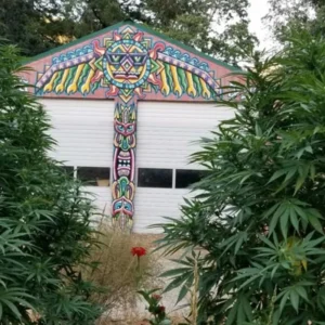 Colorful painted mural on the barn at Five Sisters Farm